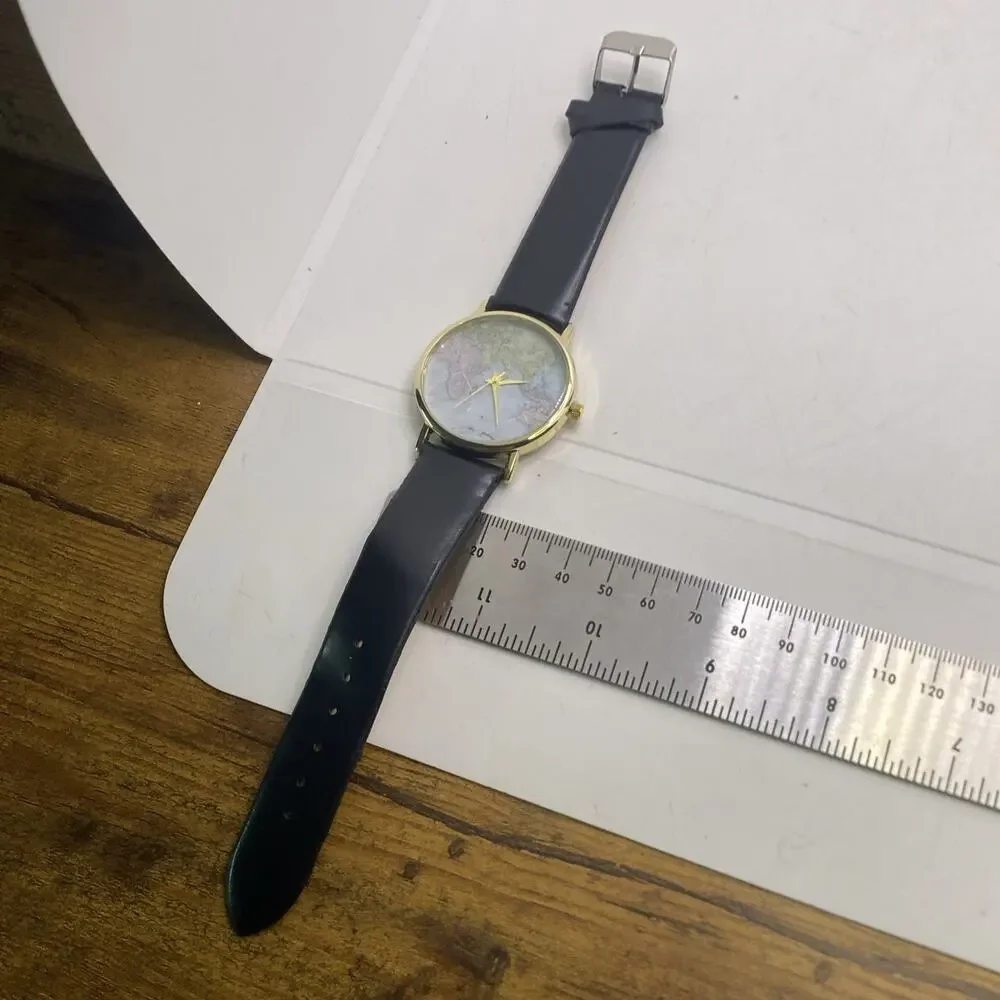 Womens Gold Tone World Map Watch New Battery